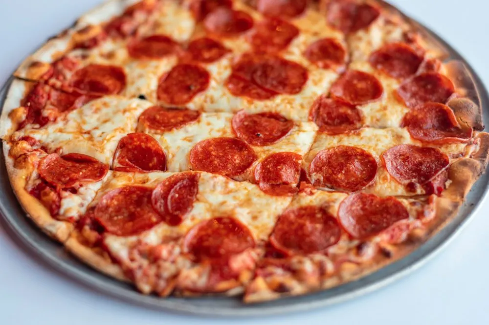 Keep it simple with the Pepperoni Pizza at Candlelite. (Photo courtesy of David Lee) for CFM Asks: Pat Fowler, Owner of Candlelite, a Tavern Style Pizza Joint in Rogers Park
