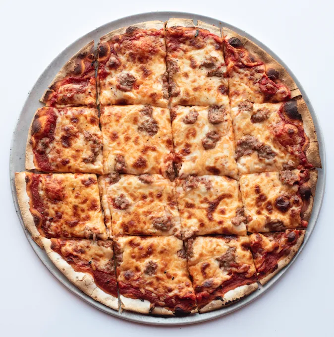 The Sausage Pizza at Candlelite. (Photo courtesy of David Lee) for CFM Asks: Pat Fowler, Owner of Candlelite, a Tavern Style Pizza Joint in Rogers Park