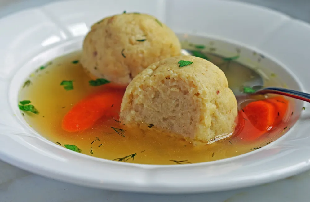 Matza Ball Soup with Carrots at Allgauer’s on the Riverfront​​ for Easter and Passover Specials Across Chicago