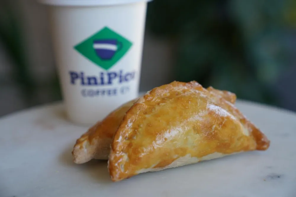PiniPico Brazilian Café, located in the Gold Coast neighborhood, will kick off National Empanada Day by offering a buy two, get one free mini empanadas ($5 for three) deal. (Photo courtesy of PiniPico Brazilian Cafe) for April Showers Bring Fun Food Events to the Calendar