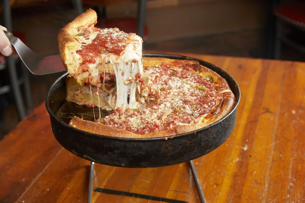 In honor of Memorial Day, Bartoli’s Pizzeria in Roscoe Village and West Town will donate a portion of proceeds from sales over Memorial Day weekend to Homes For Our Troops. (Photo courtesy of Bartoli's) for Memorial Day Specials in Chicago