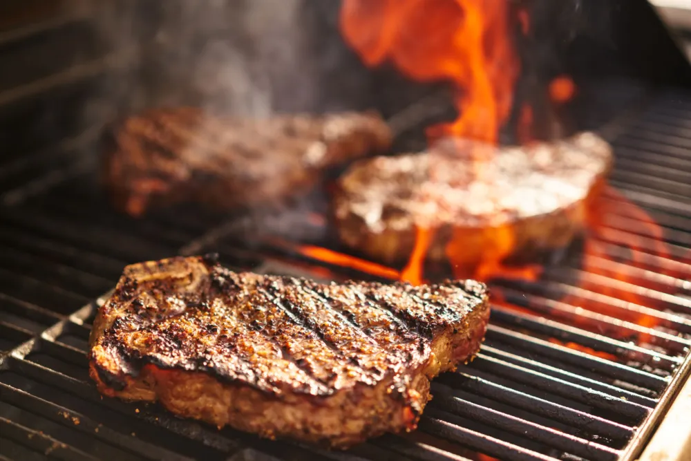 Prairie Grass Cafe Chefs Sarah Stegner and George Bumbaris have curated some cook at home packages for the entire family to enjoy. (Photo courtesy of Prairie Grass Cafe) for Father's Day Dining, Gifts & Specials in Chicagoland