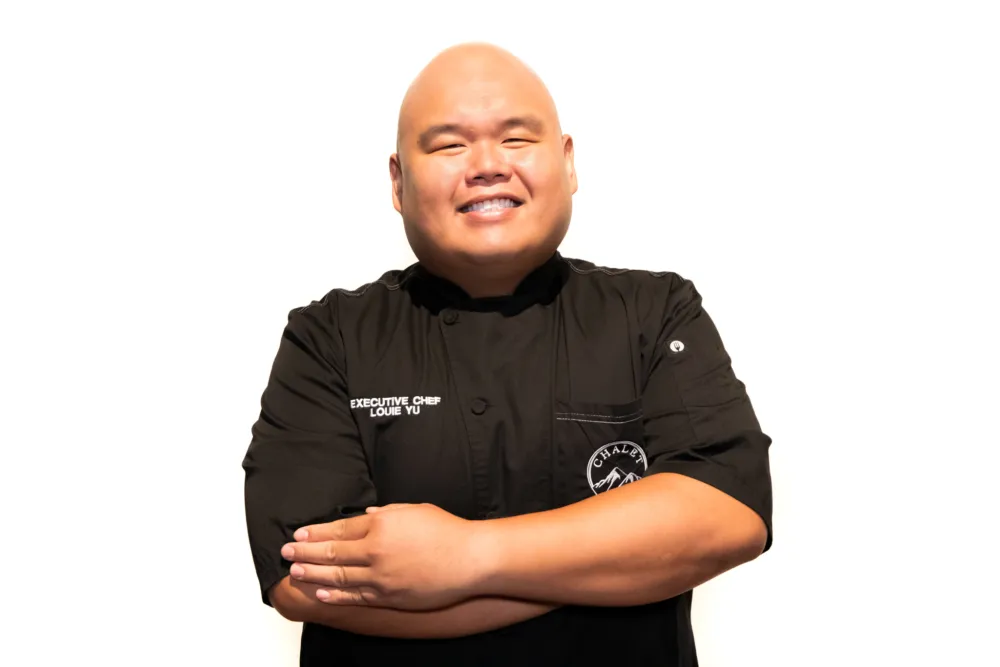 �Executive Chef Louie Yu, formerly of Sunda, is set to bring his culinary experiences to the kitchen at the forthcoming ski resort inspired concept, Chalet, located at 228 W. Chicago Avenue in River North’s previous Farmhouse space. (Photo courtesy of Chalet) for Chalet Announces Louie Yu as Executive Chef