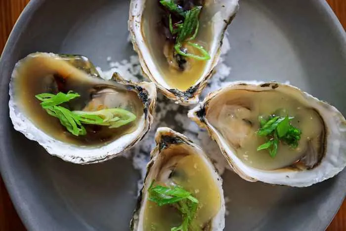Grilled Oysters 4 for Where to Get Your Oyster Fix on National Oyster Day, August 5th