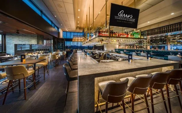 In Vernon Hills, Bar 79, named after the year Perry’s was founded, will feature a island bar with glass walls that open to patio dining. (Photo from Perry’s Nashville) for Perry’s Steakhouse & Grille Opening Its Third Chicago Area Restaurant
