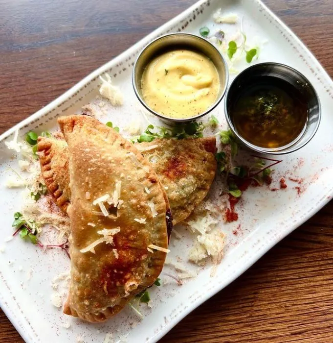Beef Empanadas with Saffron Aioli and Chimichurri (photo courtesy of Lirica) for CFM Asks: Jennifer Zambrano, Executive Chef of Lirica at Navy Pier