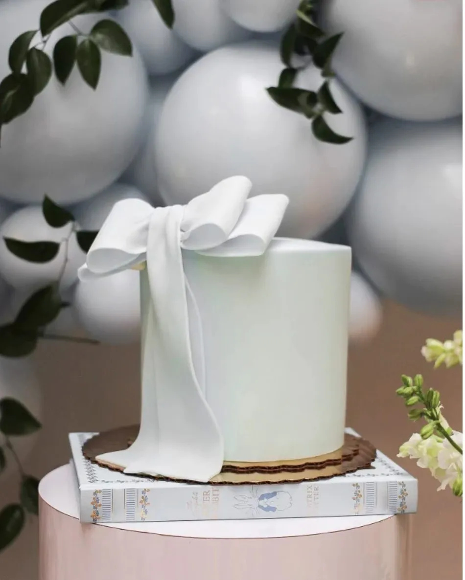 Couture Bow Cake (Photo courtesy of Bittersweet Pastry) for CFM Asks: Bittersweet Pastry's Lead Cake Decorator, Kerrie Breuer