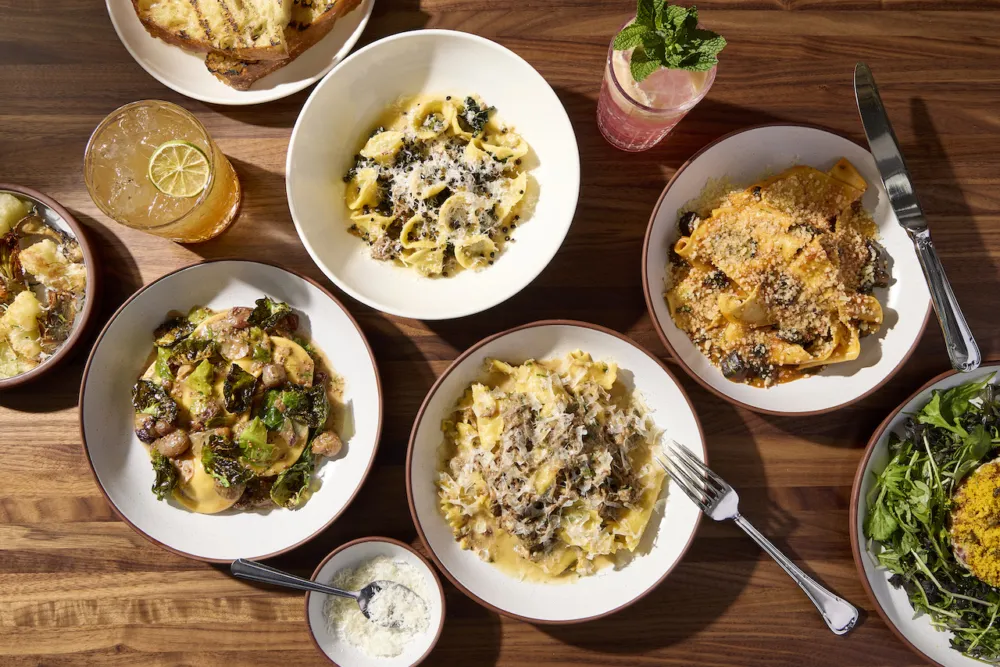 Table Spread 1 for Chicago Restaurants That Are Turning Up the Romance for Valentine's Day 2024