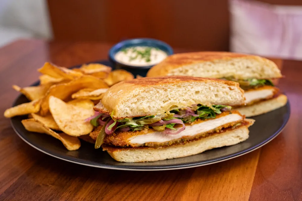 Courtesy of Kinship for Staytion Market & Bar for Where to Find the Best Sandwiches for National Sandwich Month this August