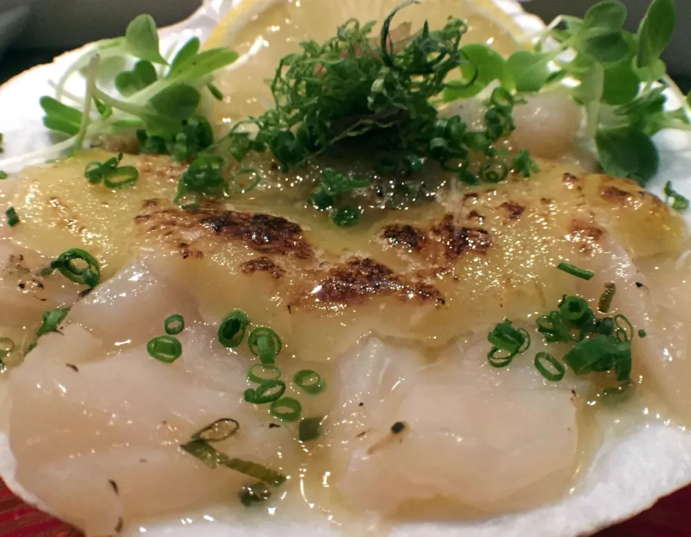 Macku signature live scallop for Macku Sushi Offers Instagram Worthy Presentations in an Intimate Environment