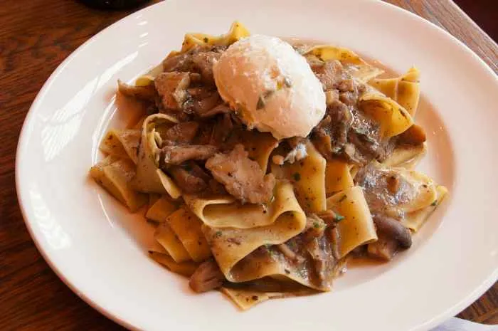 March Noodle Month Pappardelle with wild mushroom goat cheese and shaved asparagus 06 for National Noodle Month at Tesori