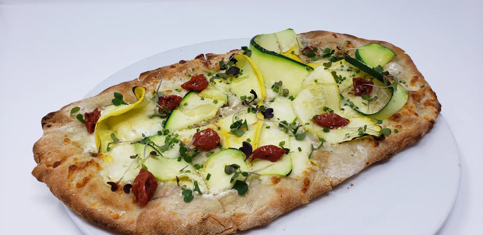 Pinsa Zucchini 2 for Casati’s Celebrates National Cheese Pizza Day with Buy One Get One Free Cheese Pinsas