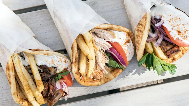 Wrap Group for Avli Debuts Greek Street Food Carry out Menu in River North
