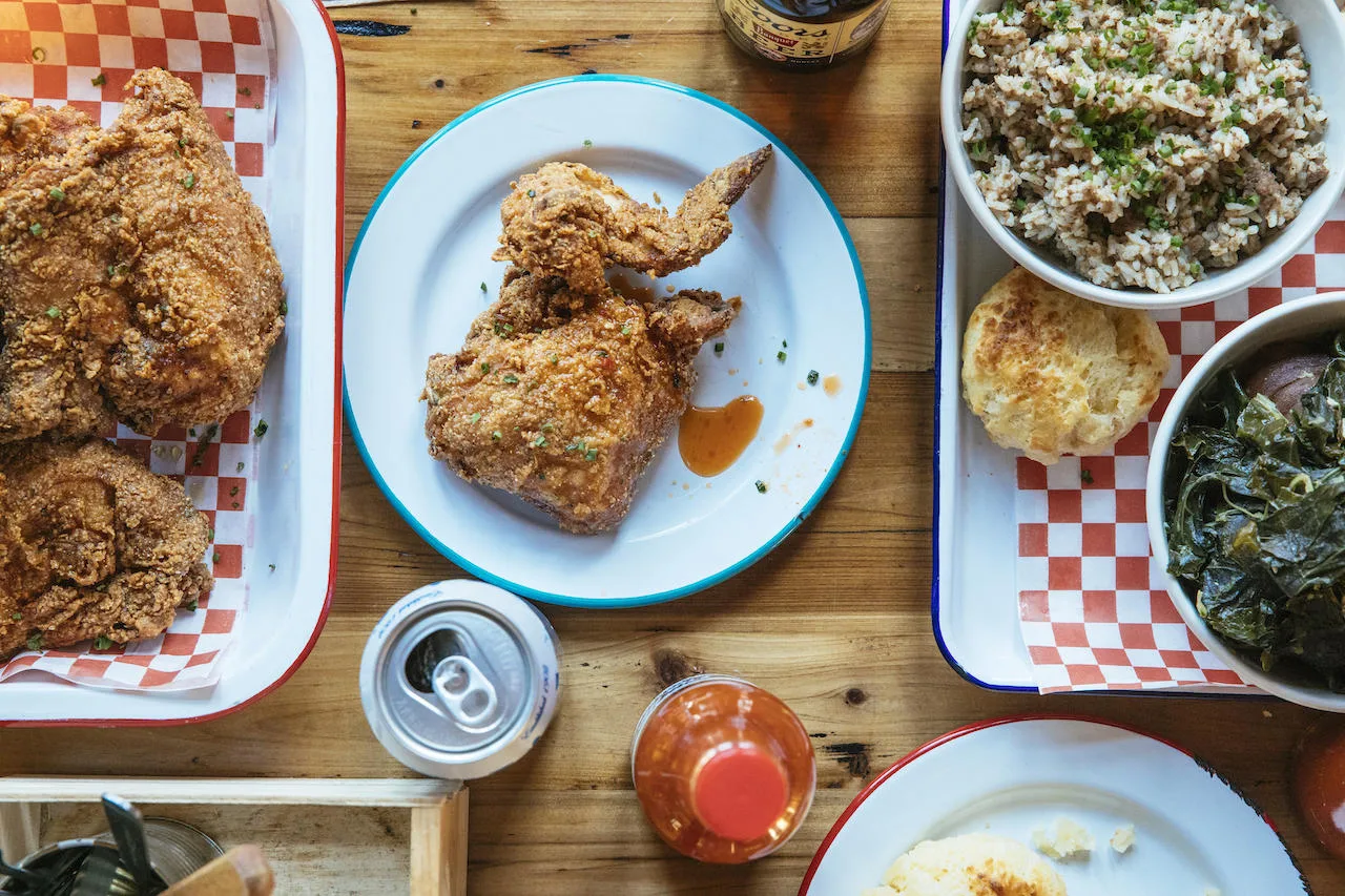 Big Chicken Dinner Spread 3 Heather Talbert 2 for National Fried Chicken Day and Mac ‘n Cheese Day Offerings from Ina Mae Tavern and Frontier