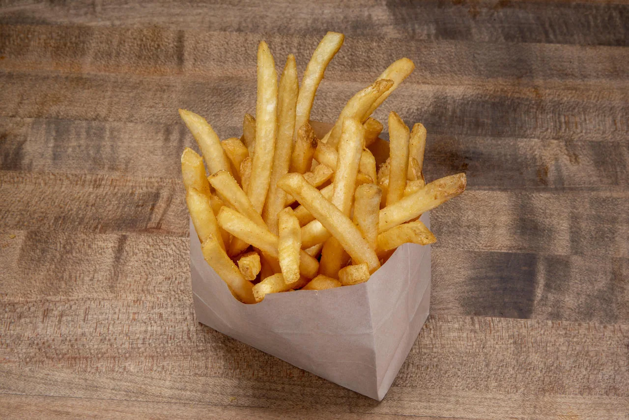 Tab Sides Fries 1946 for Dog Haus Biergarten Partners with Warner Bros. Pictures’ Blue Beetle on Free Fry Friday