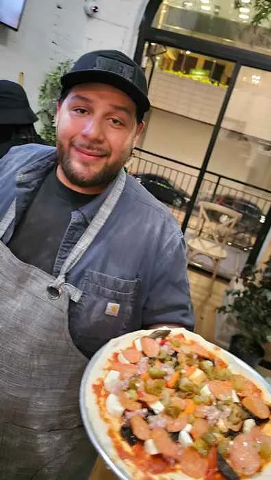 Chef Marco Colin With Pizza for New Dates Added For Tree House Chicago Pizza Making and Wine Experience
