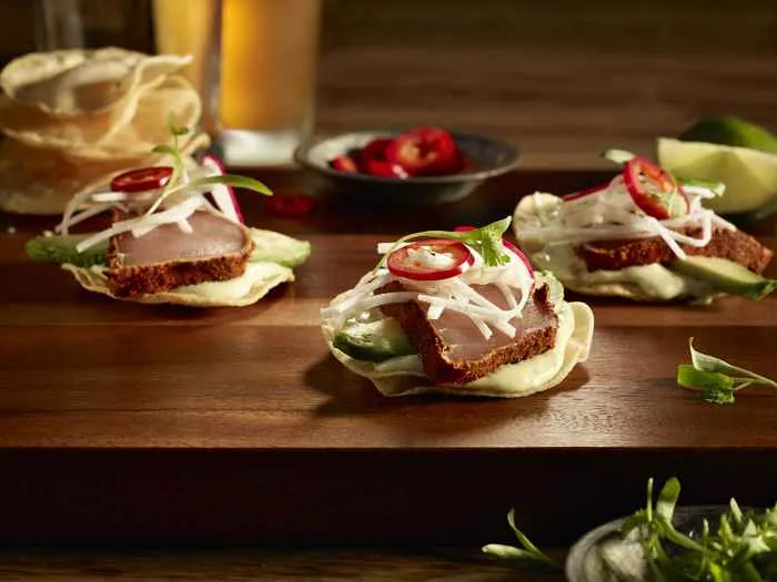 Earls Tuna tostadas appetizer for Earls Kitchen + Bar Rings in the New Year with 5 Course Prix Fixe Dinner