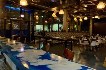 Red Fish Blue Fish Interior for Seafood Joins Barbecue at the New Co branded Porkchop and Red Fish Bleu Fish in Hyde Park