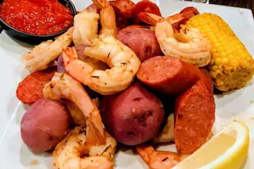 The Rambler Shrimp Boil Plate 2 for What to do in February: Celebrate Black History Month, Mardi Gras and More!