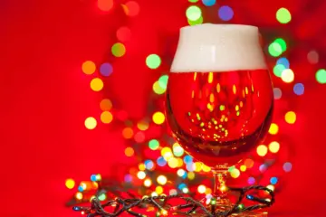 Christmas Beer With Lights Low for Holiday Specials at Mac’s Wood Grilled