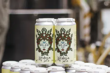 Medusa Pale Ale Can Display Flora Brewing for Pilot Project Partners with Female Founded Flora Brewery to Release Four New Beers