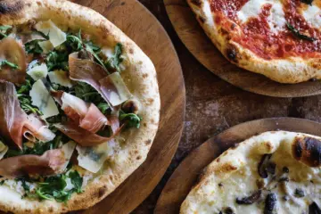 Pizza for Carlucci Chicago donating $5 for every entree and pizza during July to anti cruelty