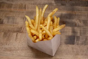 Tab Sides Fries 1946 for Dog Haus Biergarten Partners with Warner Bros. Pictures’ Blue Beetle on Free Fry Friday