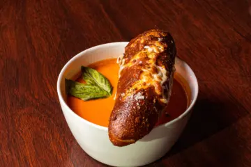 Tomato Basil Bisque 04 Soup Spoon for Soup Spoon a Delivery & Carryout Soup Restaurant Now Open and Operating at Hyde Park Location of Bob’s Pizza