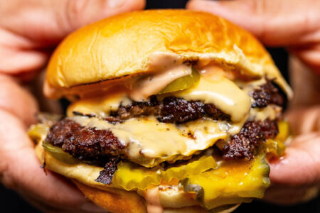 Close Up Nadc Burger for Michelin star Chef and Pro Skateboarder Bring a Second NADC Burger Location to Chicago