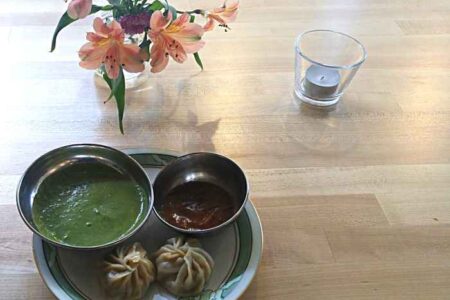 ChickenCurryDumplingWithCilantroSauceandTomatoCurry for Logan Square Welcomes Nepalese Flare to Milwaukee Ave