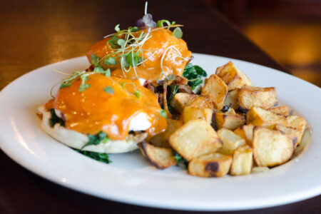 Eggs Benedict LR with potato photo by Cindy Kurman edited 2 for Prairie Grass Cafe to Host Easter Brunch and Offer Takeout Menu