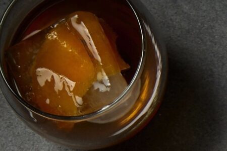 drink III Forks Old Fashioned Bone In Ribeye for Celebrate National Bourbon Day at III Forks Prime Steakhouse