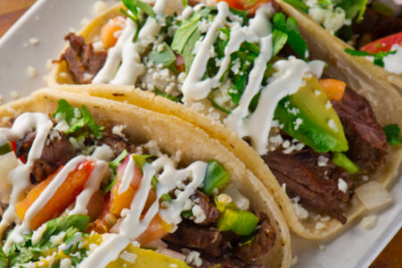 Tacos De Fajita Cantina Laredo for National Taco Day Around Town