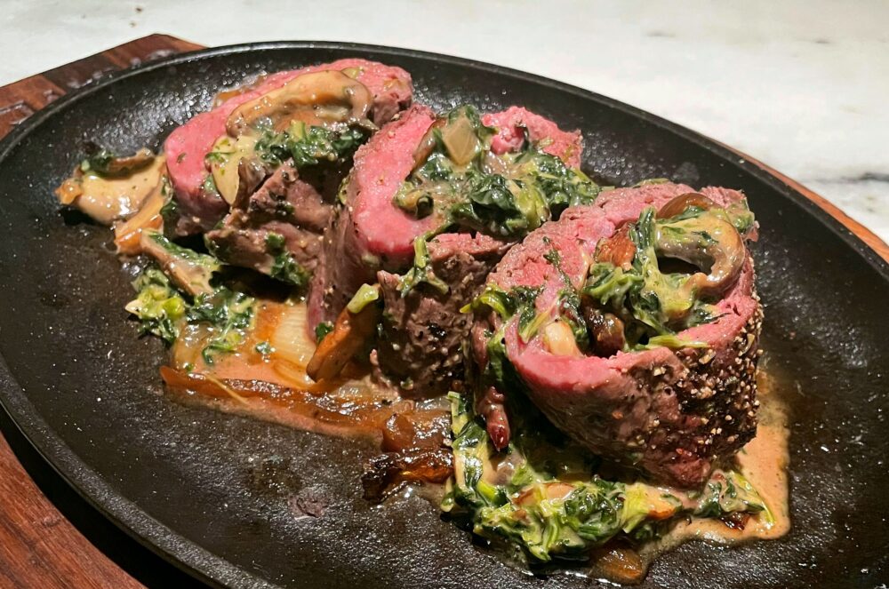 10 oz. Filet Mignon stuffed with sautéed spinach, wild mushrooms, garlic, onions, fresh herbs and three cheeses served with Truffle Merlot Demiglace. for Perry’s Steakhouse & Grille Celebrates Mother's Day with Dining Options