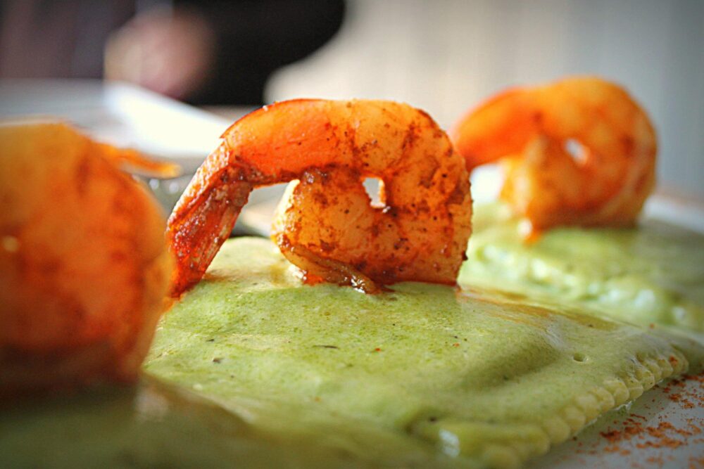 Tapas selections features Al Raviole Basque shrimp, homemade ravioli, roasted Serrano pesto sauce for Altiro Brings Latin Fusion Tapas to Roscoe Village