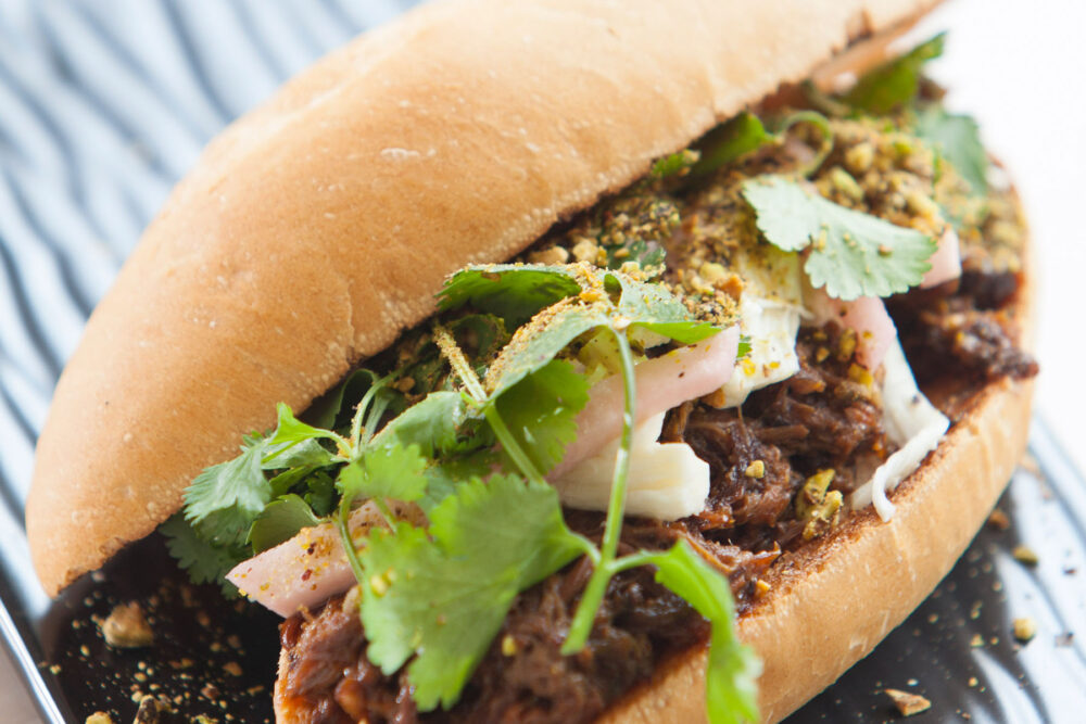 Lamb Barbacoa Torta for Bar Takito Launches Weekend Late Night Menu