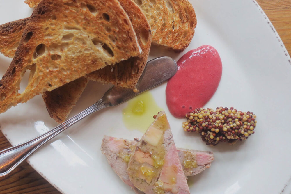 Duck and foie gras terrine, pickled mustard seeds plum jam, sourdough toast for The Bristol Launches New B Sides Menu Series Feature: Duck