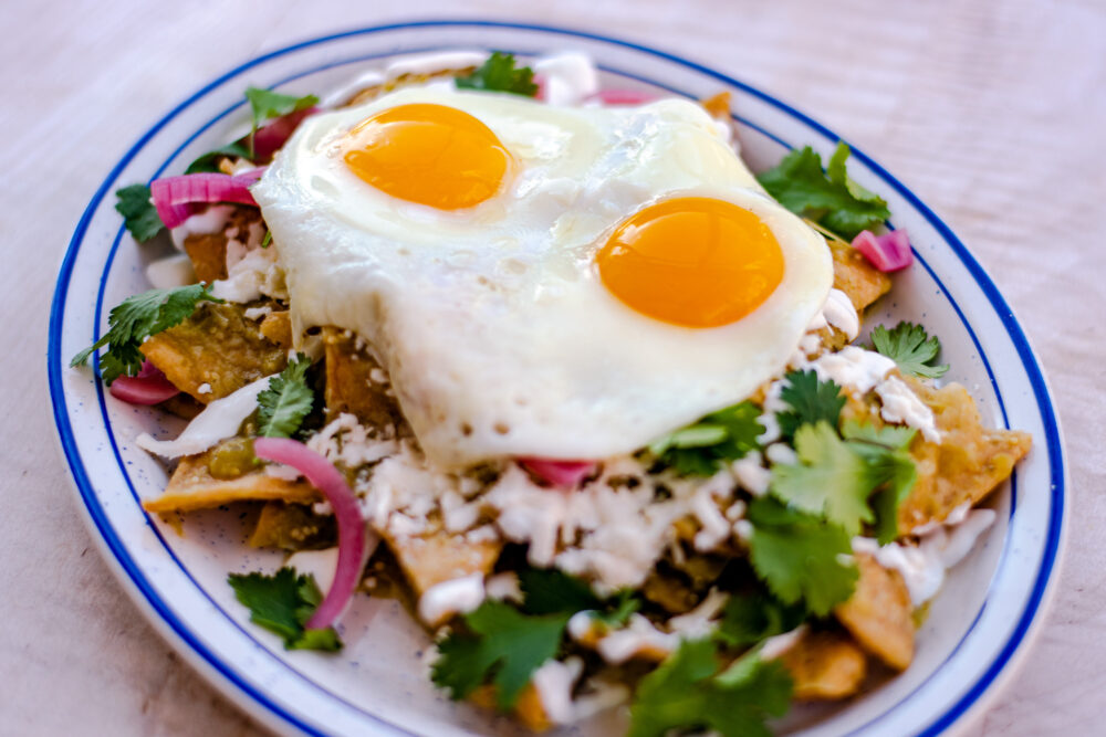 The Chilaquiles at The Kitchen American Bistro (photo credit to Leah McClay, courtesy of The Kitchen Restaurant Group) for Pamper Your Mom this Mother's Day at These Chicago Food and Beverage Destinations