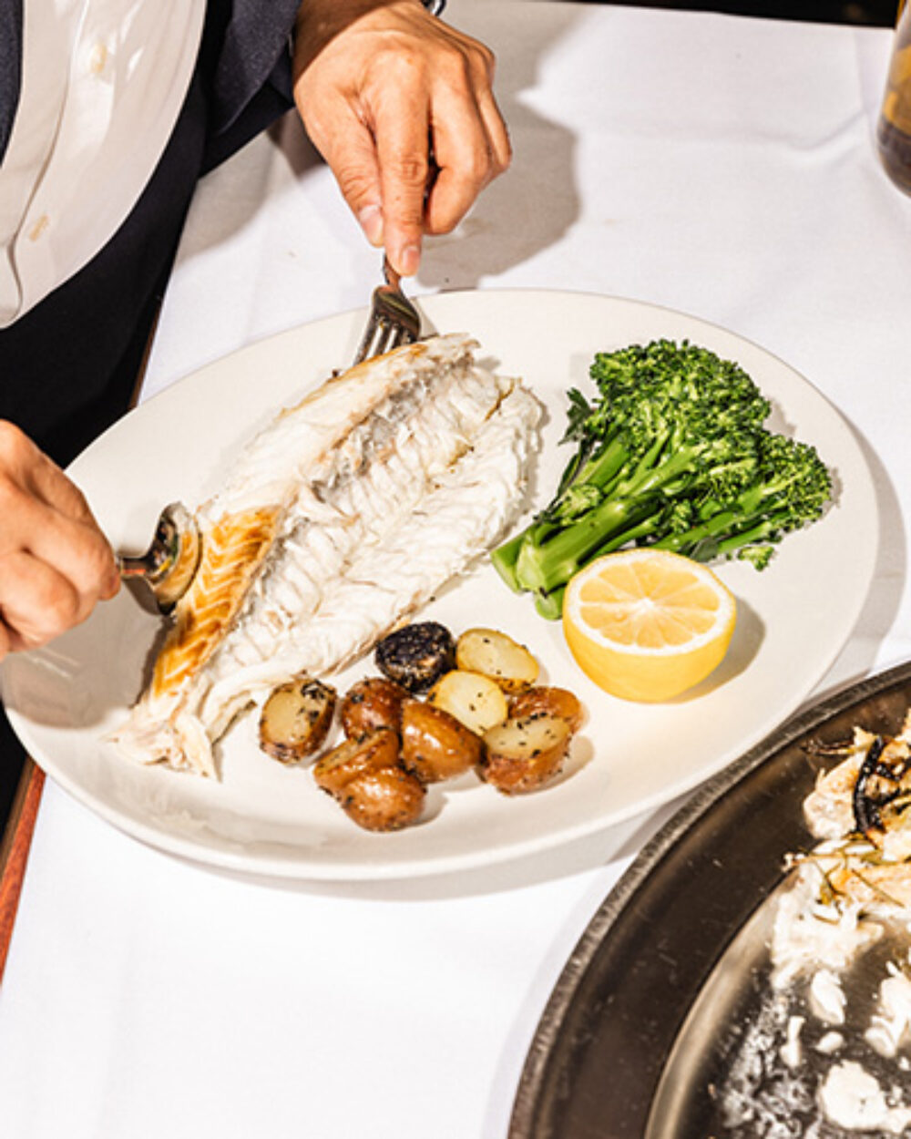 The Branzino prepared tableside. All photo credits: Garrett Sweet for CFM Asks: Jack Weiss and Sam Weiss of Coco Pazzo