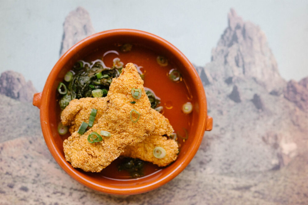 Cornmeal Fried Catfish Catfish marinated in buttermilk, fried, served with pickled mustard greens in a smoked ham chile de arbol broth. Photo credit: Sandy Noto for Dove's Luncheonette Launches New Menu Items