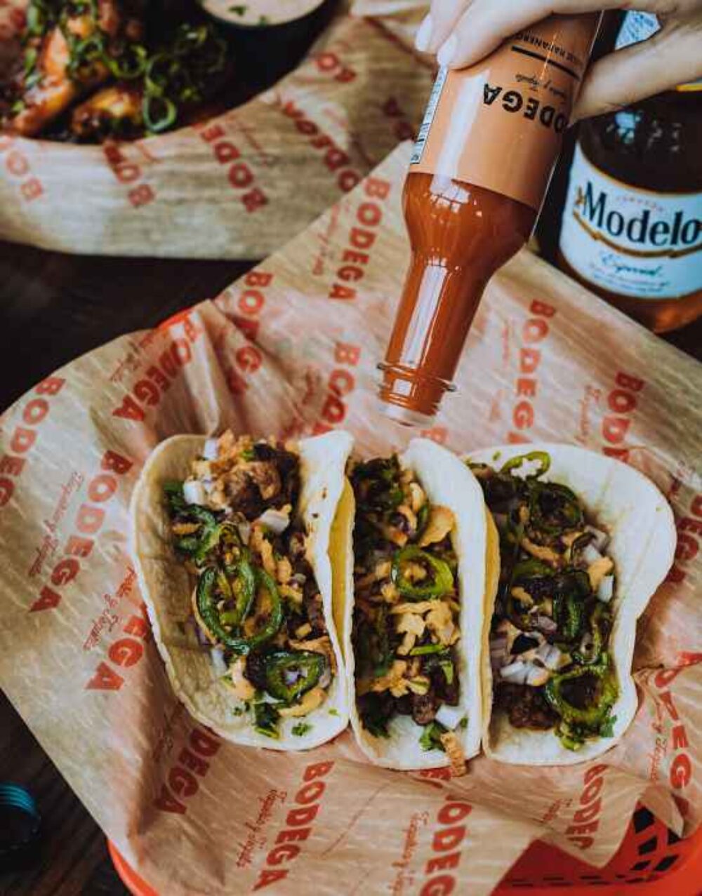 Jalapeño Brisket Tacos Hot Sauce Drizzle for 420 Events & Specials in Chicago