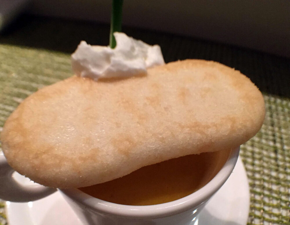Carrot soup with puréed carrot, alaskan king crab, white miso, cream, chives and rice cracker for Macku Sushi Offers Instagram Worthy Presentations in an Intimate Environment