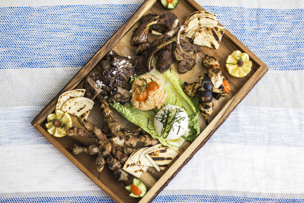 Tsiknopempti is part of the traditional celebrations of Apókries, the Greek Carnival season that centers around large amounts of grilled and roasted meats. (Photo courtesy of Avli Taverna) for What to do in March: Lenten Dining, March Madness, St. Patrick's Day and More!