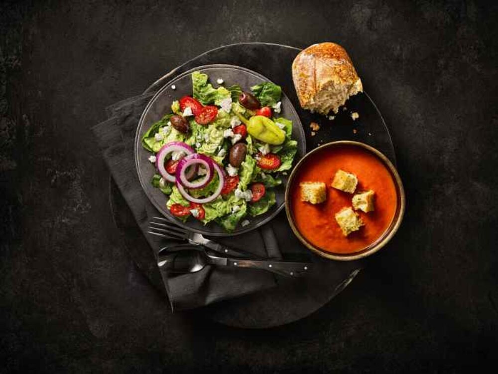 The Greek Salad & Creamy Tomato Soup Duet at Panera Bread a half portion of Greek Salad served alongside a cup of Creamy Tomato Soup. (Photo courtesy of Kitchen United Mix) for CFM Asks: Atul Sood, Chief Business Officer of Kitchen United Mix, a Ghost Kitchen That's Meant to be Seen