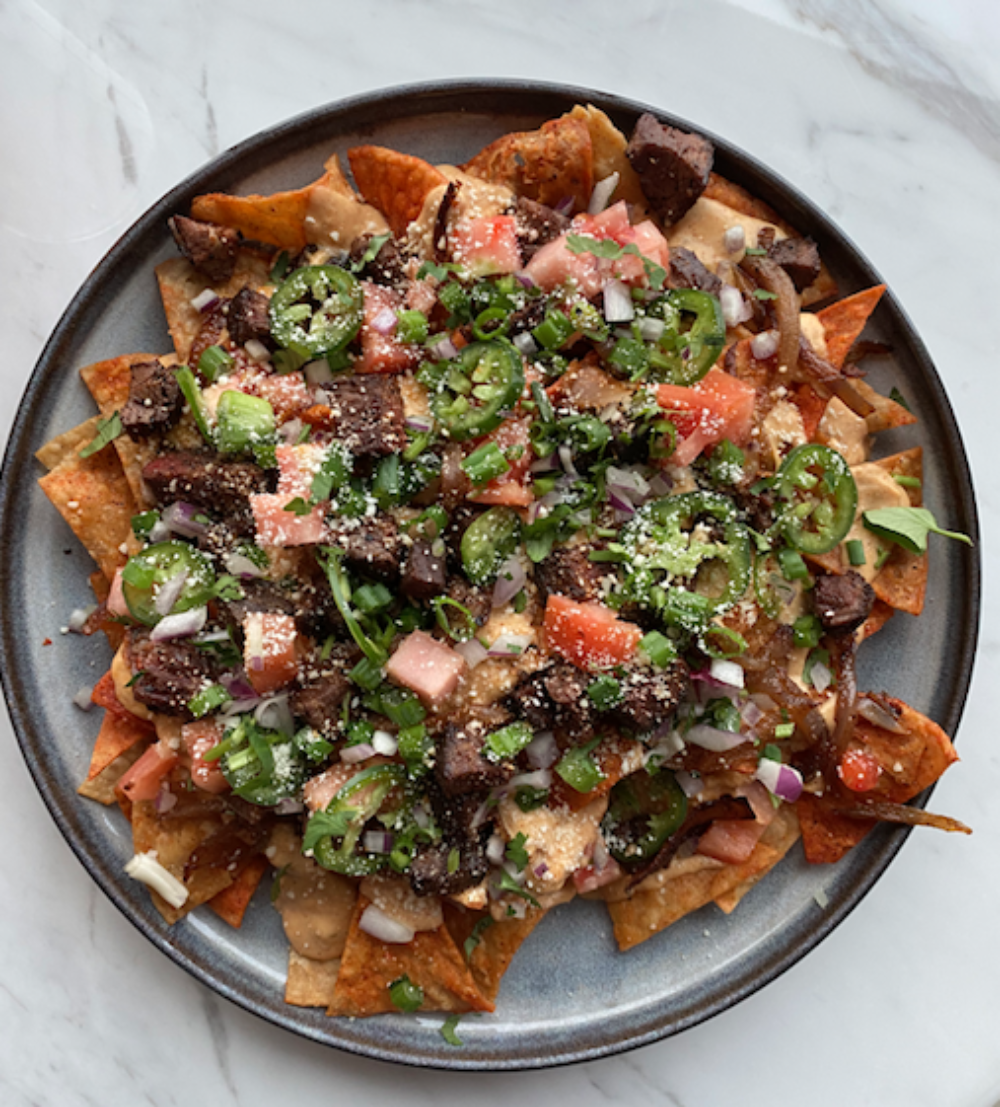 Chow down on Thorn's Flat Iron Nachos for the big game! (Courtesy of Thorn Restaurant & Lounge) for What To Order For Super Bowl Sunday