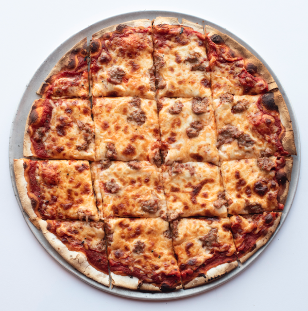 The Sausage Pizza at Candlelite. (Photo courtesy of David Lee) for CFM Asks: Pat Fowler, Owner of Candlelite, a Tavern Style Pizza Joint in Rogers Park