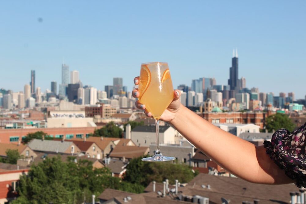 Kennedy is currently serving up specialty drinks and dishes Thursday through Sunday on their deck in Wicker Park. (Photo courtesy of Kennedy Rooftop) for Where to Enjoy Outdoor Dining for Chicago Patio Season