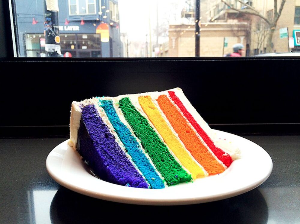 In honor of Pride Month, The Goddess and Grocer is donating a portion of their Goddess Rainbow Cake sales to Center on Halsted. (Photo courtesy of The Goddess and Grocer) for Where to Celebrate June Pride Month in Chicago