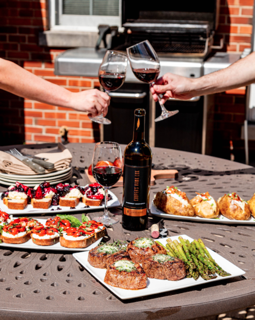 Cooper's Hawk Executive Chef Matt McMillin and his team have put together a grill kit for four this Father's Day. (Photo courtesy of Cooper's Hawk) for Father's Day Dining, Gifts & Specials in Chicagoland