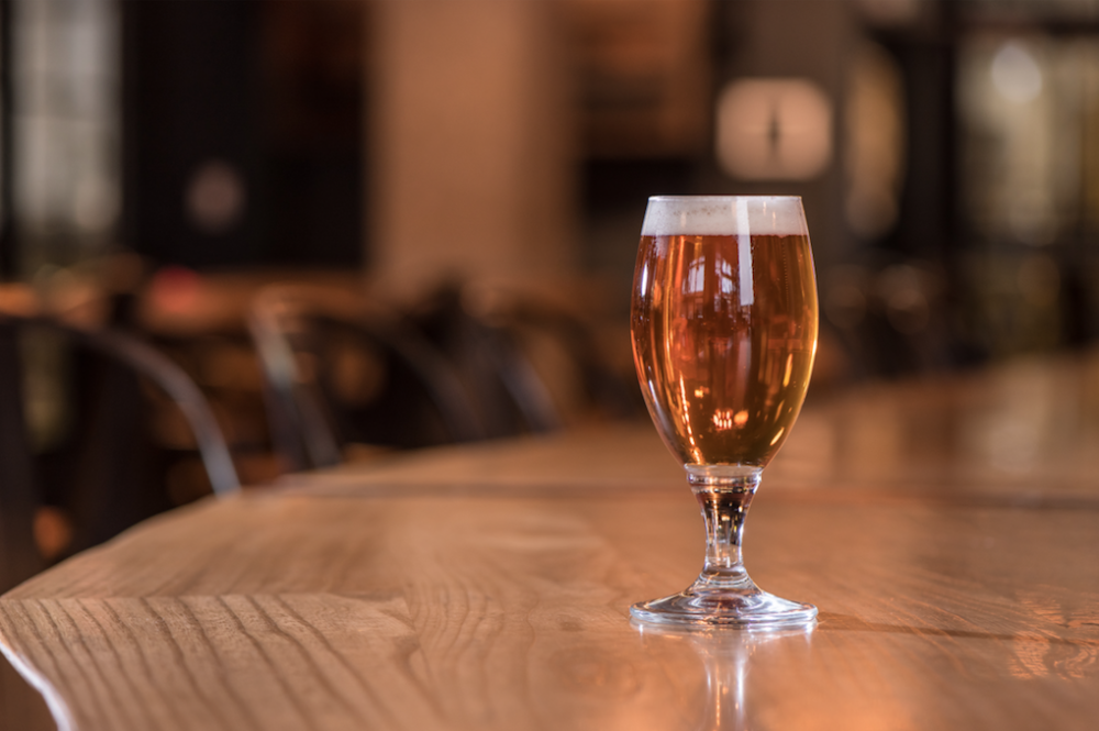 Bottleneck Management​’s Bottlenectar​ is an exclusive beer brewed in collaboration with Goose Island Brewery​. (Photo courtesy of Bottleneck Management Group) for Where to Imbibe on National Beer Lovers Day, September 7